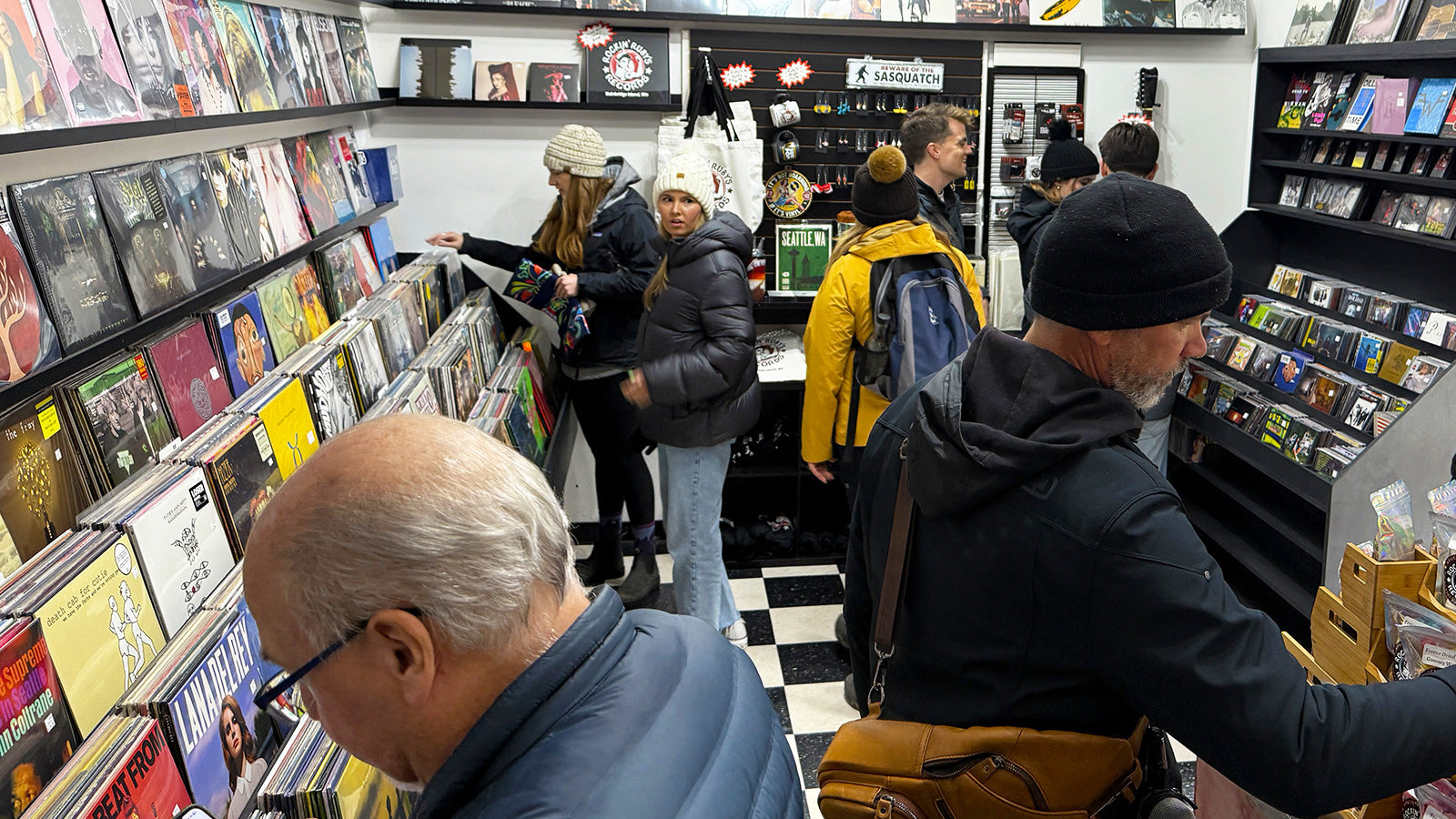 People browsing records in the Rockin' Ruby's Records store on Bainbridge Island, WA
