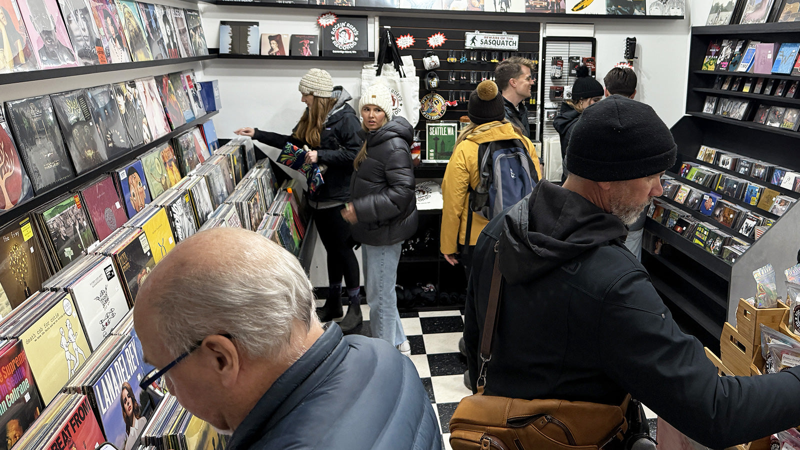 People browsing records in the Rockin' Ruby's Records store on Bainbridge Island, WA